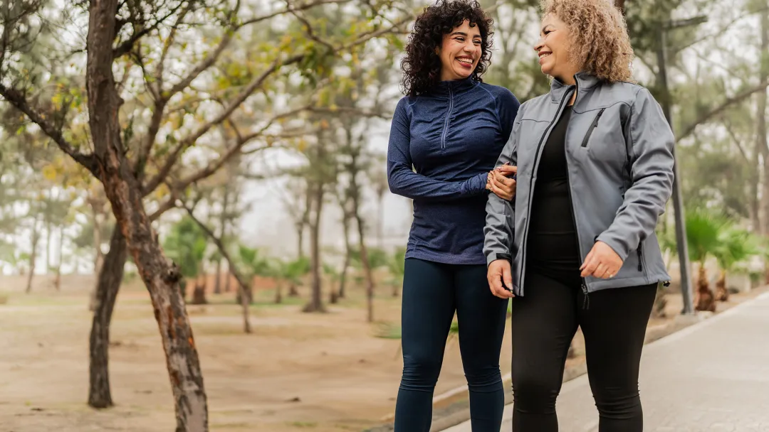 Women walking in public park