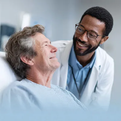 male doctor with male patient in hospital