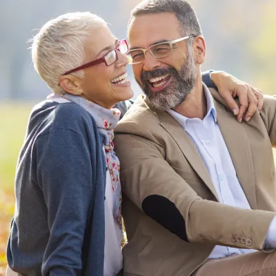 Happy, healthy couple in the park.